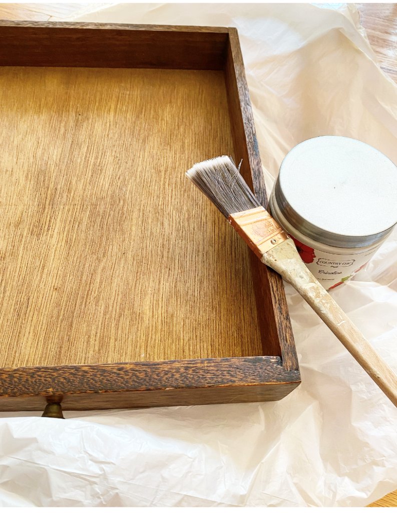 drawer with paint and paint brush